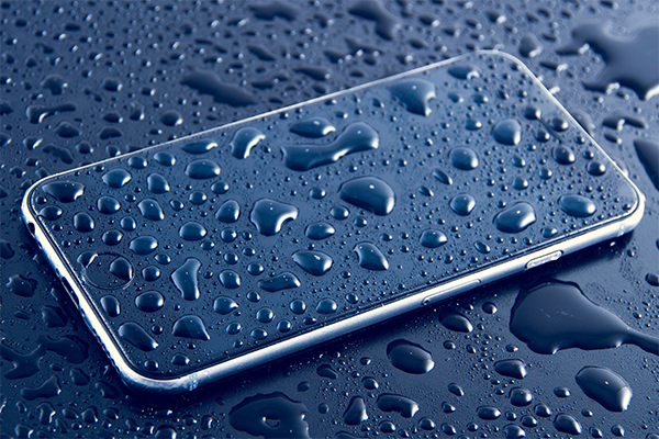waterproof phone covered in water droplets